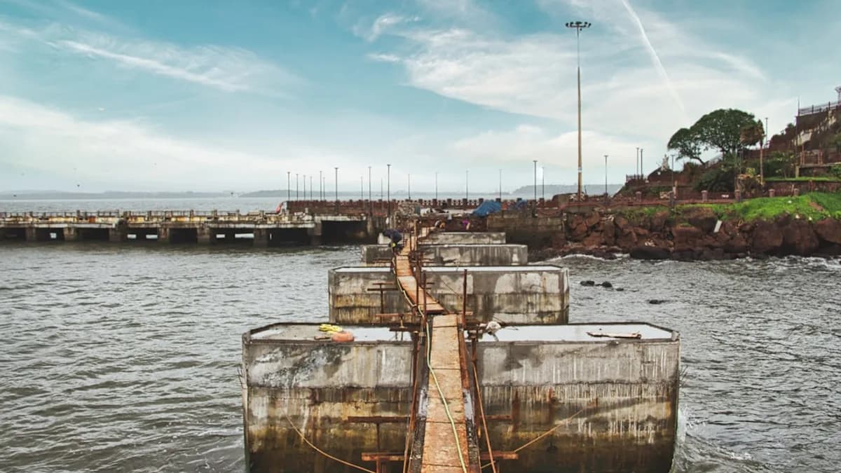 a long wooden bridge over a body of water