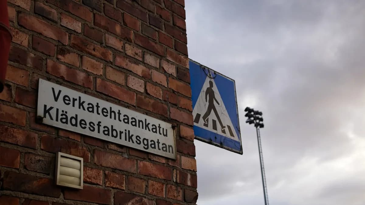 a sign on a brick building