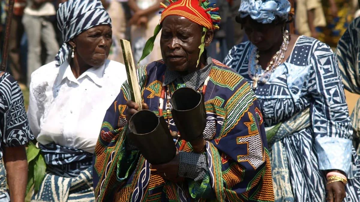 Elderly people in traditional african attire during a ceremony