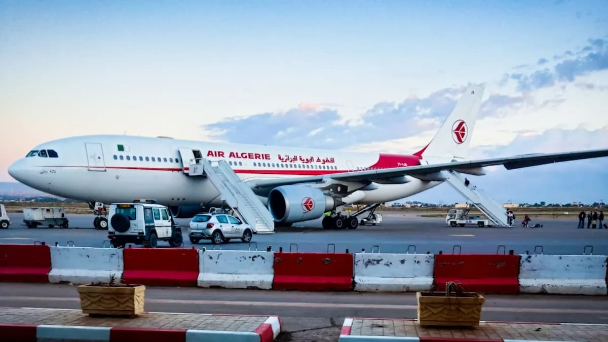 a large jetliner sitting on top of an airport tarmac