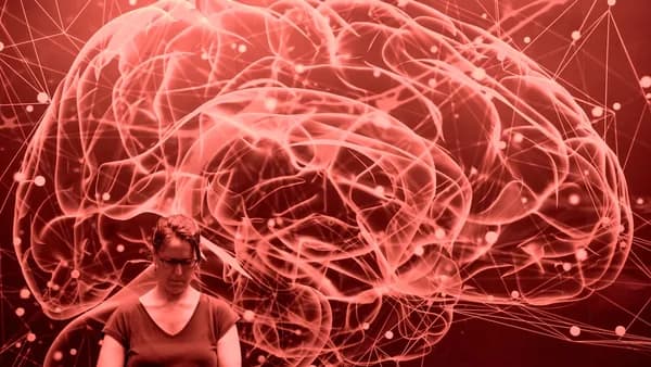 Abstract red brain network with a person