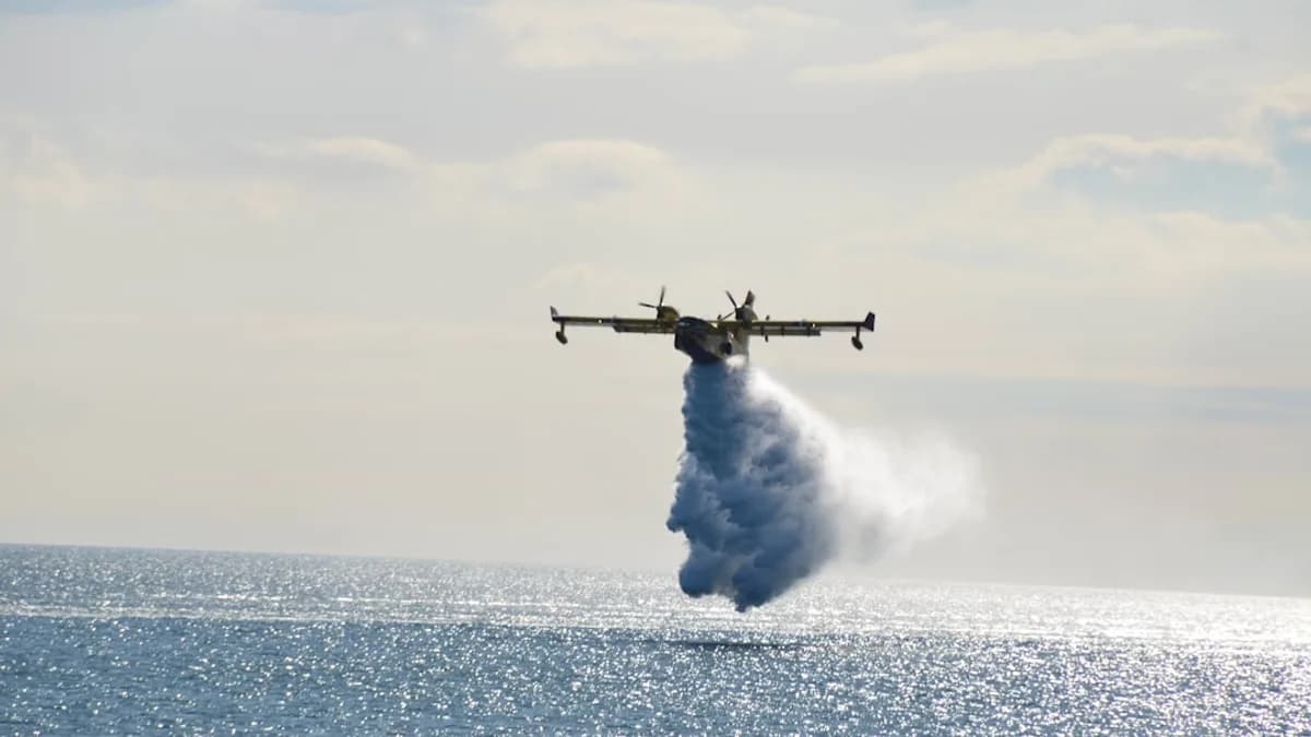 a plane flying over the ocean