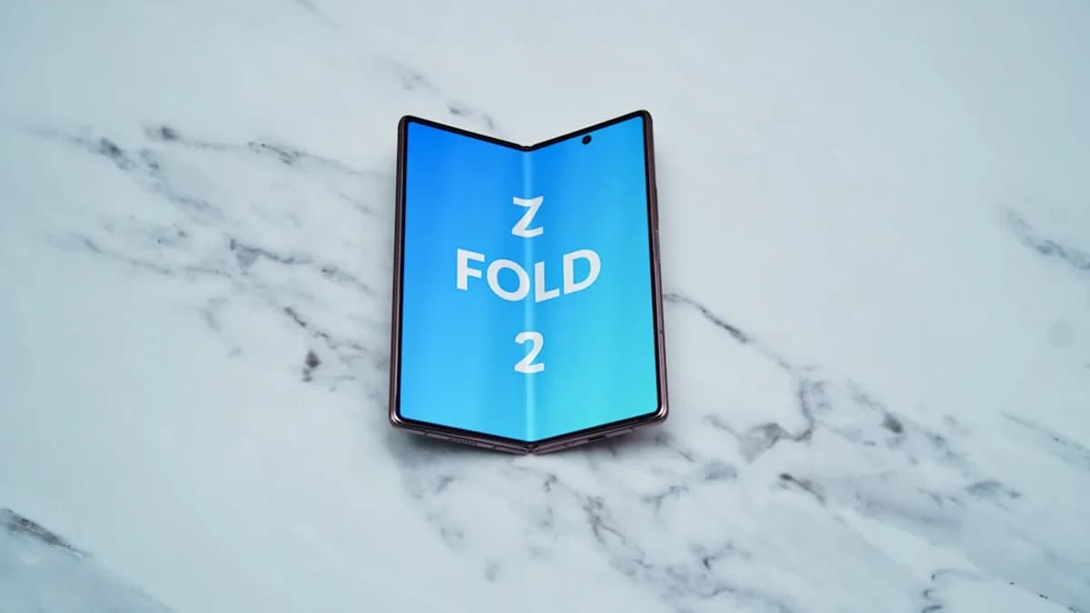 a blue sign on a white surface