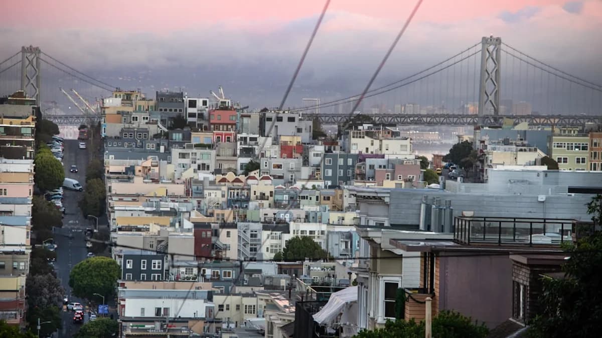 San francisco cityscape with bay bridge at sunset