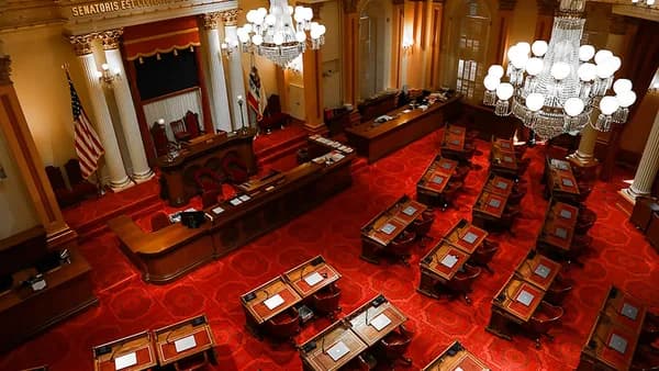 brown wooden chairs inside room