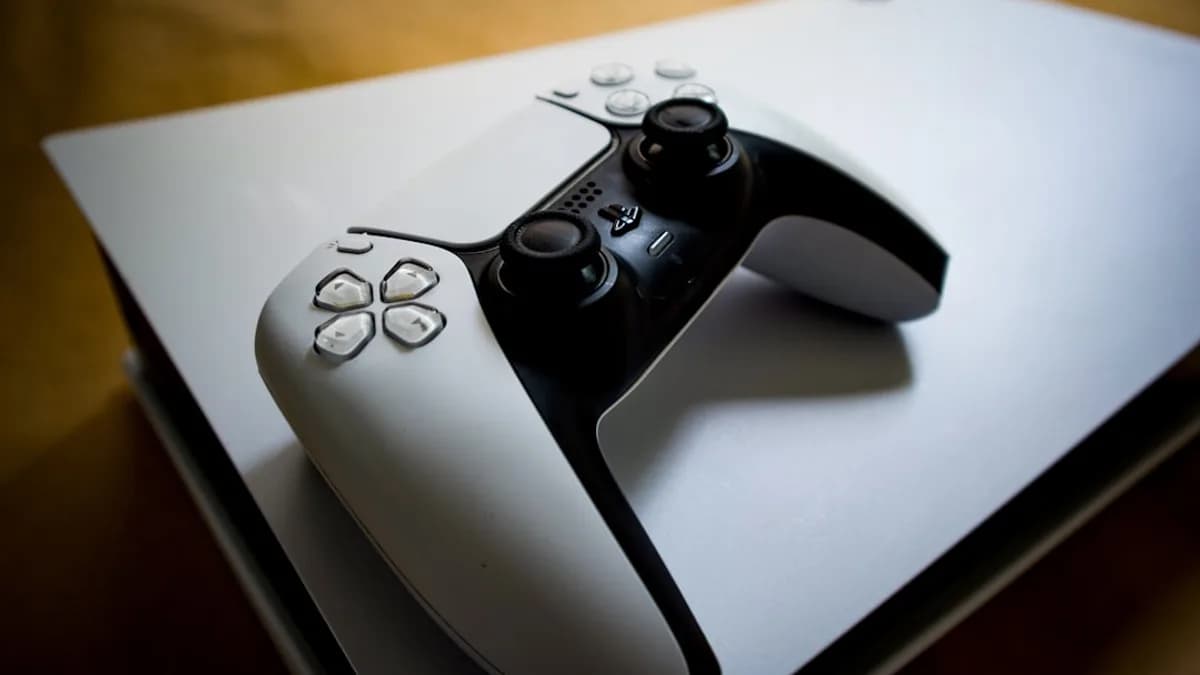 A playstation 5 console with its controller.