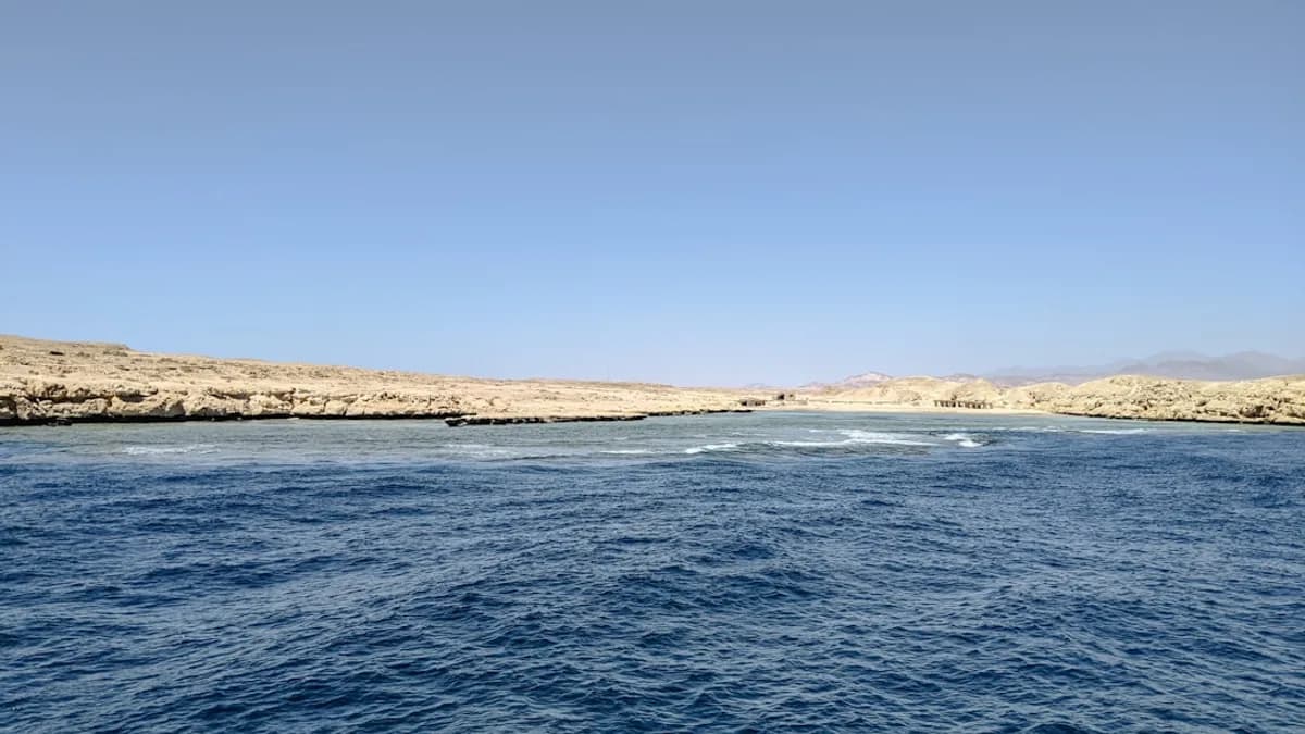 a body of water next to the ocean