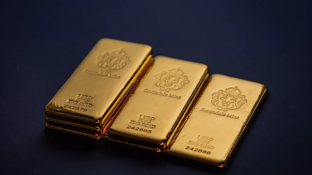 Three gold bars stacked on top of each other
