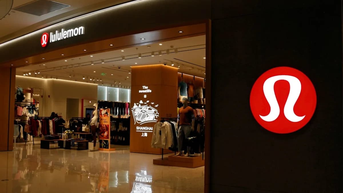 a shopping mall with a sign that says the store is open