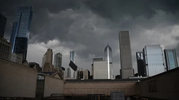 city buildings under gray clouds during daytime