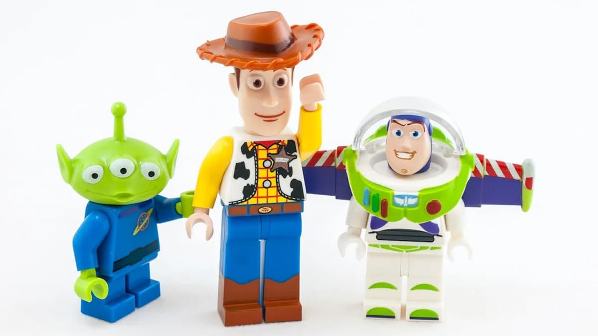 a couple of toy figurines standing next to each other