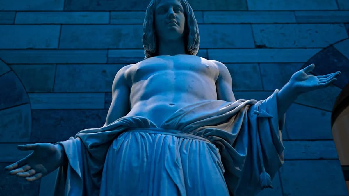 man in white robe statute