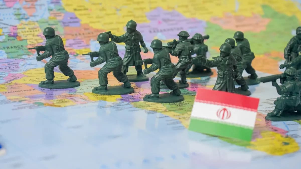 Toy soldiers on a world map with iranian flag.