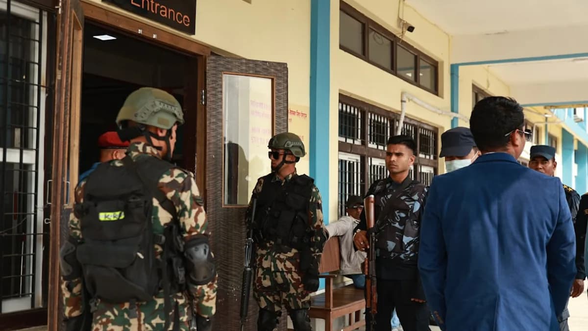 Soldiers stand guard at an entrance