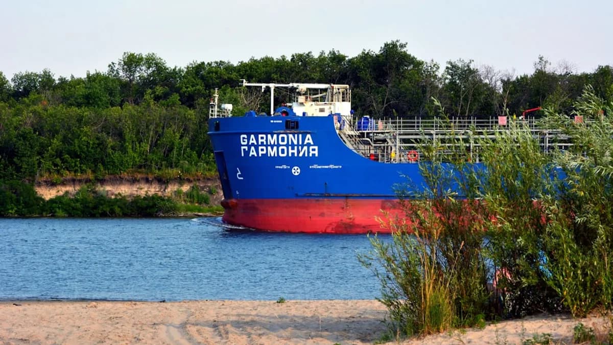 a large blue and red boat on a body of water