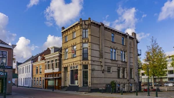 brown concrete building under blue sky during daytime