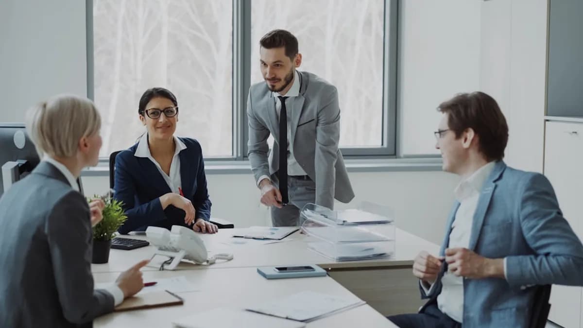 Business professionals collaborating around a conference table.