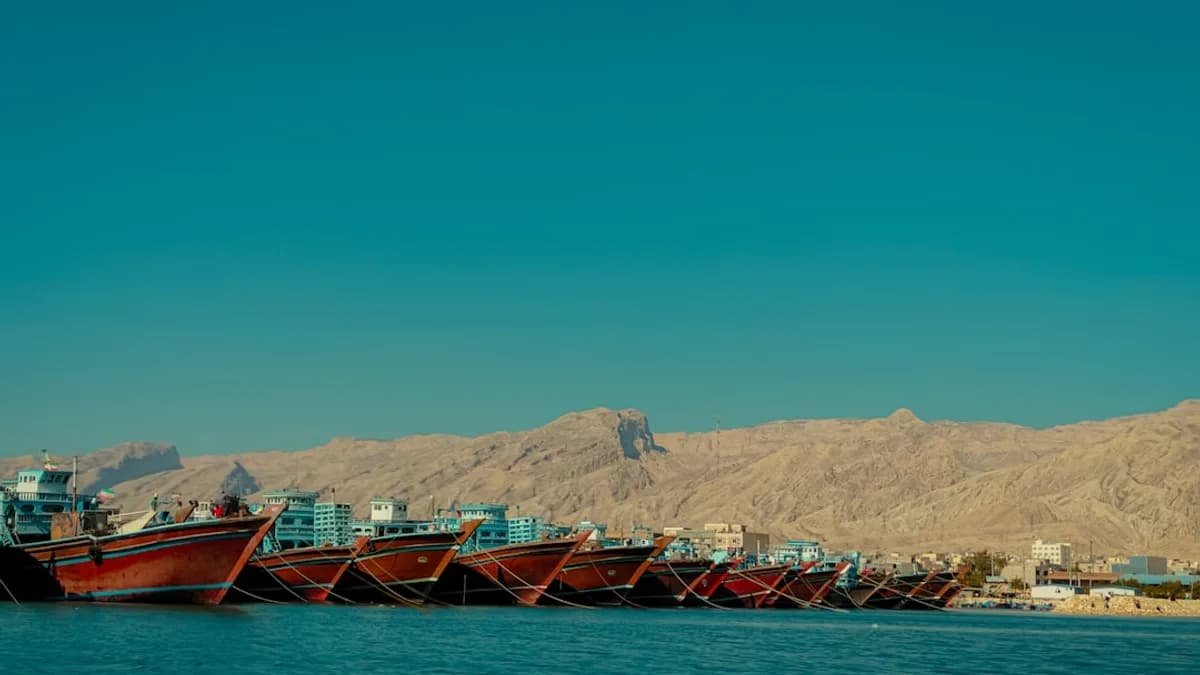 a group of boats that are sitting in the water