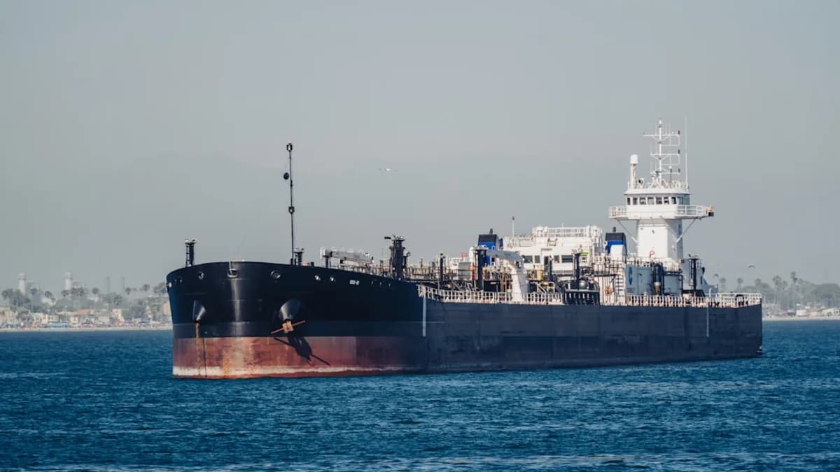 A large cargo ship in the middle of the ocean