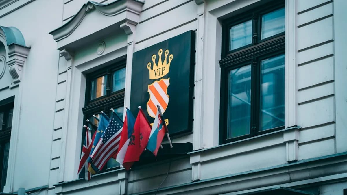 a group of flags on a building