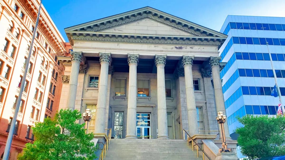 a building with columns and a staircase
