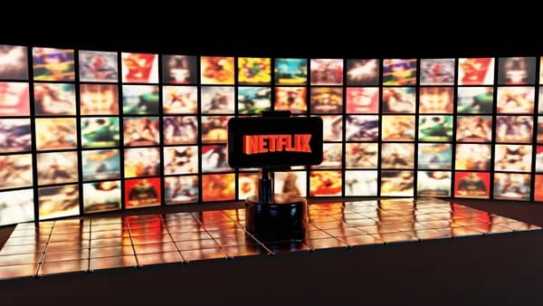 Netflix logo displayed on a wall of movie posters