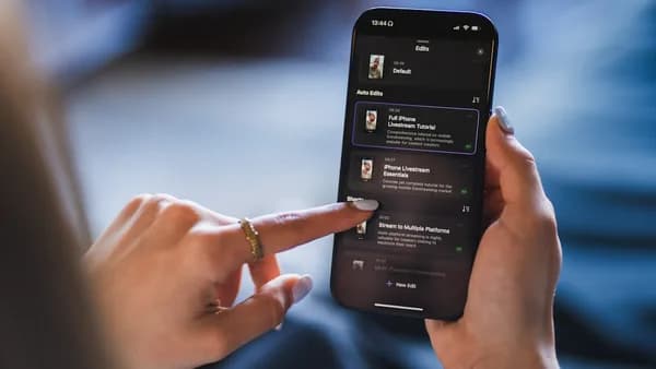 Person using a smartphone with a list on the screen