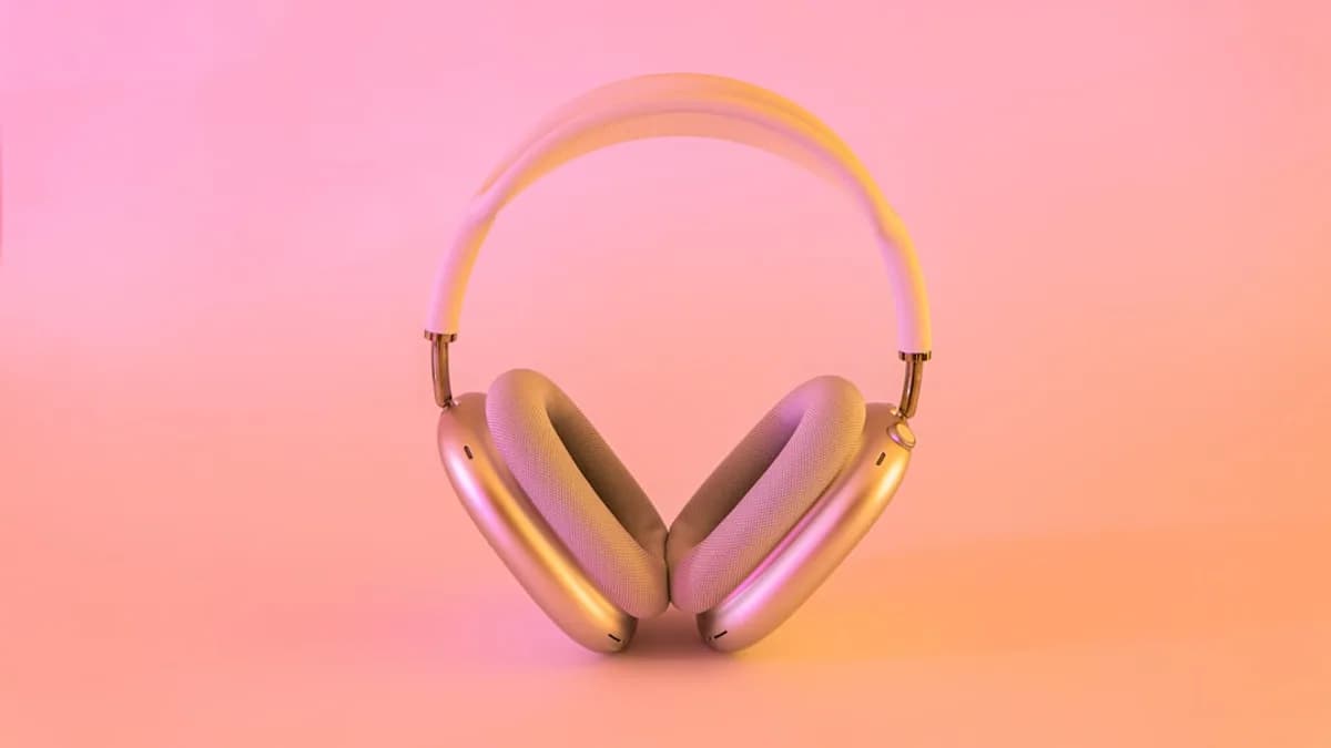 pink and white wireless headphones