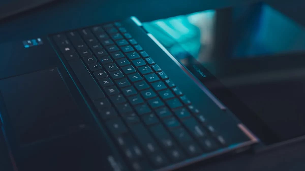 black and blue laptop computer