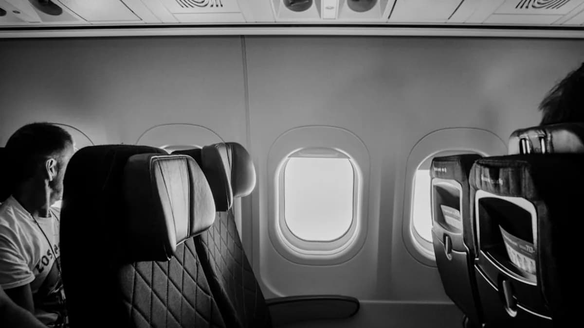gray scale photo of train seat