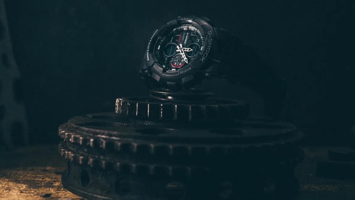 black and silver round watch