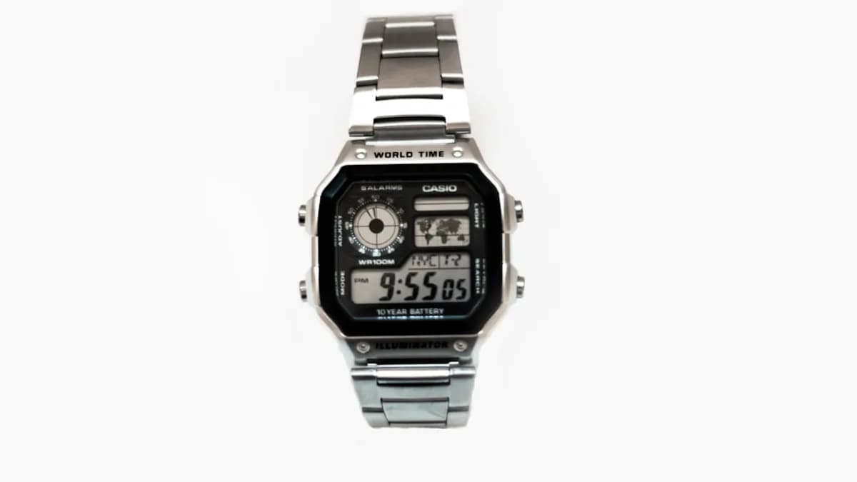 black and silver-colored Casio digital watch with link bracelet
