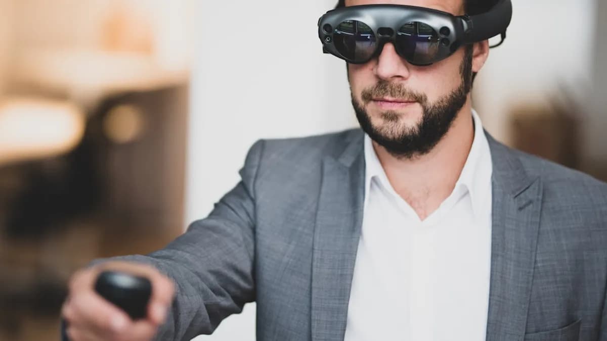 man wearing VR box and holding remote control