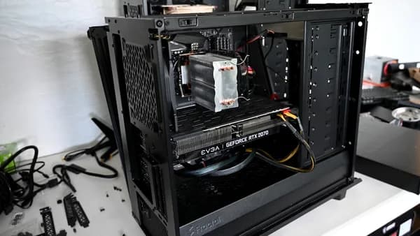 black computer tower on white table