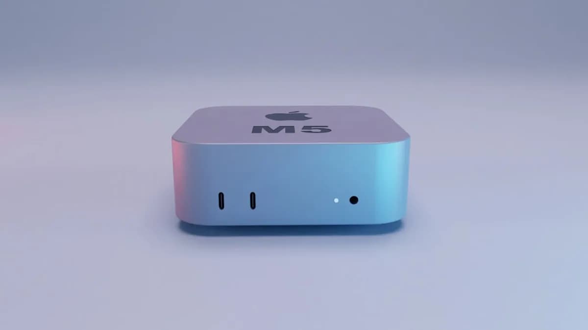 Silver apple mac mini computer on white surface