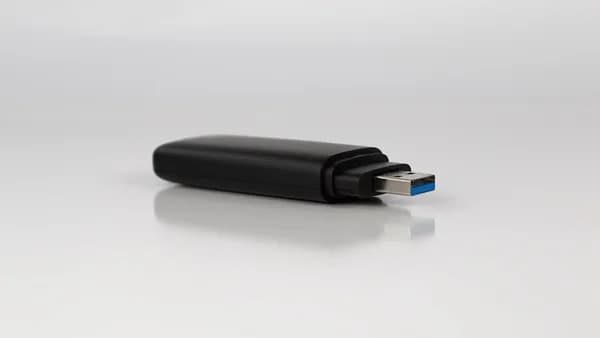 a close up of a usb device on a white surface