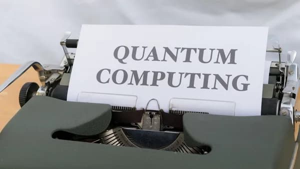 a close up of a typewriter with a paper on it