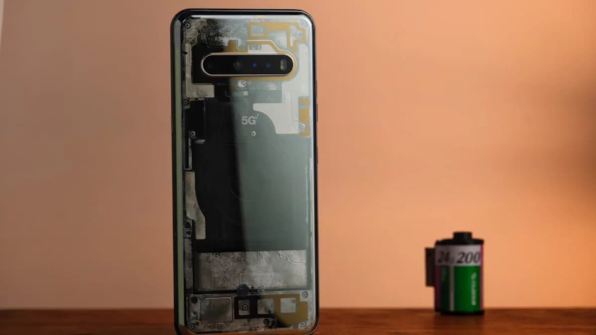 Transparent smartphone next to a film roll