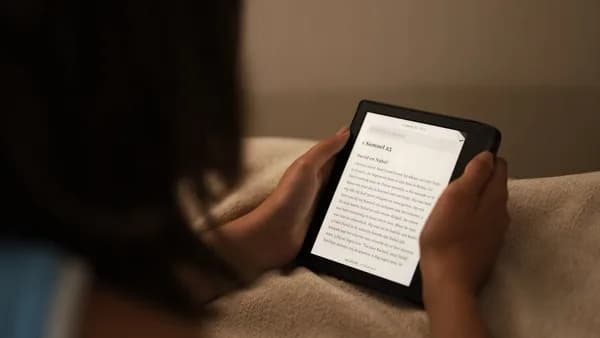 a person holding a tablet