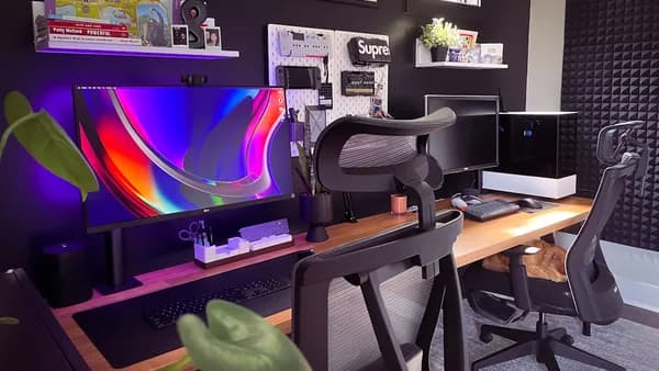 black flat screen computer monitor on brown wooden desk