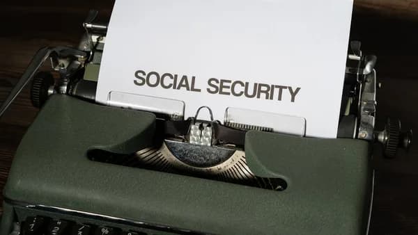 a close up of a typewriter with a piece of paper on it