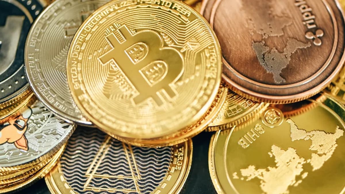 a pile of gold and silver bitcoins