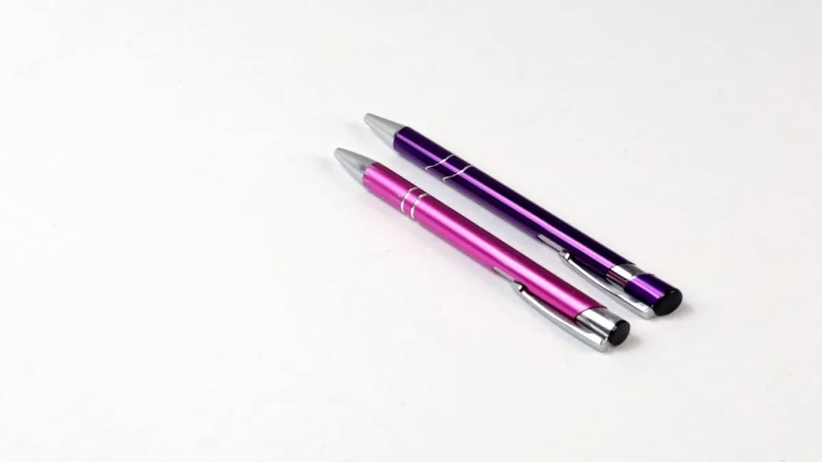 purple and white click pen