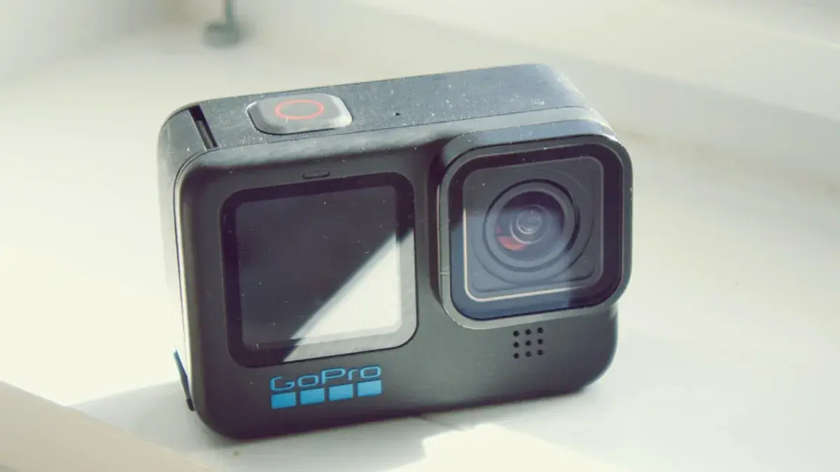 a camera sitting on top of a white table