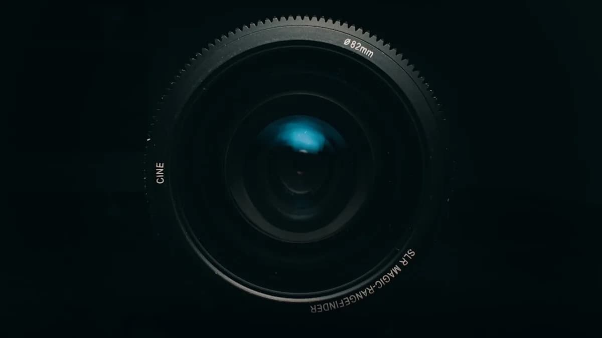 black camera lens on white background