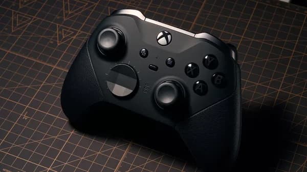 a close up of a controller on a table