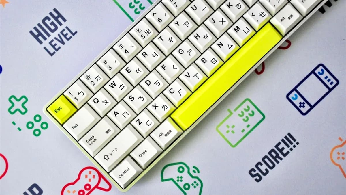yellow and white keyboard on blue and white surface