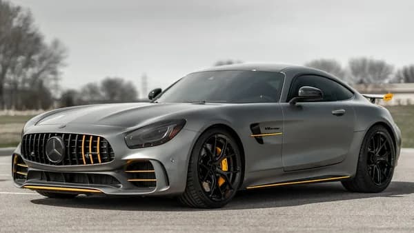 black mercedes benz coupe on gray asphalt road