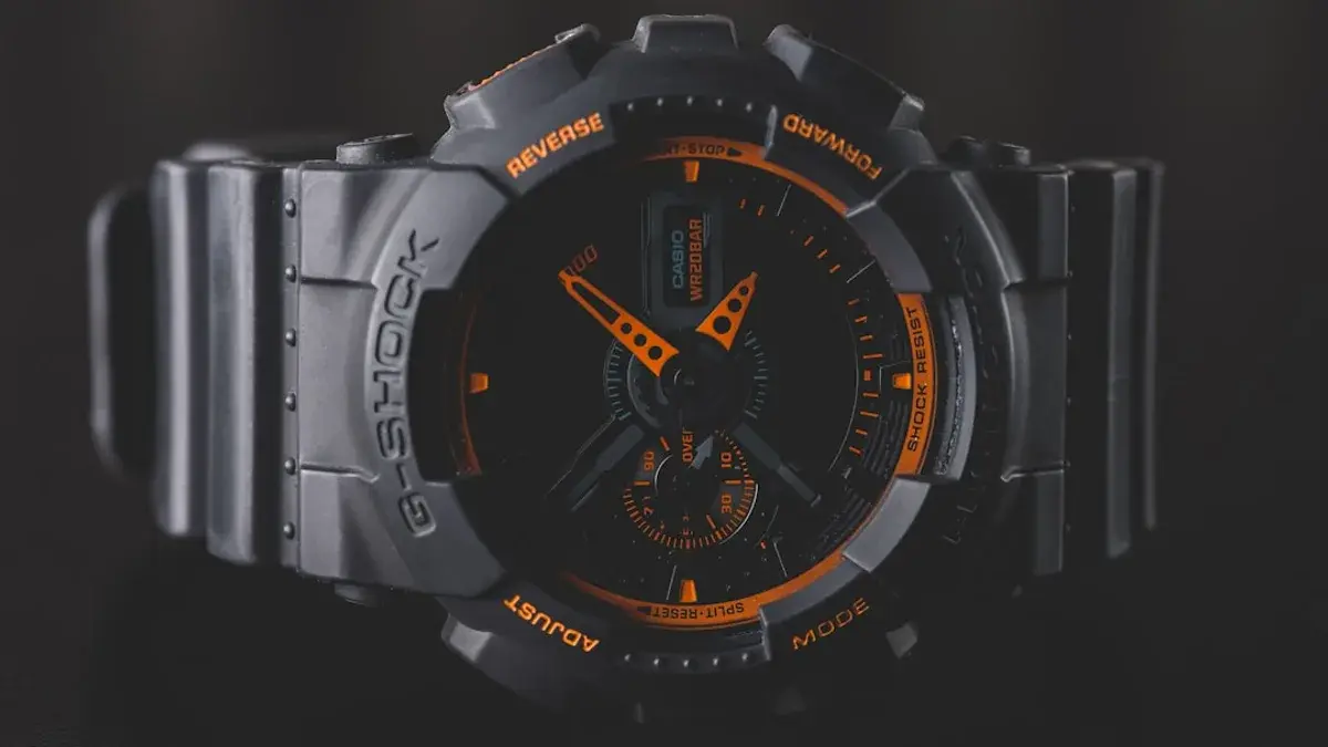 round black and orange Casio G-Shock analog watch