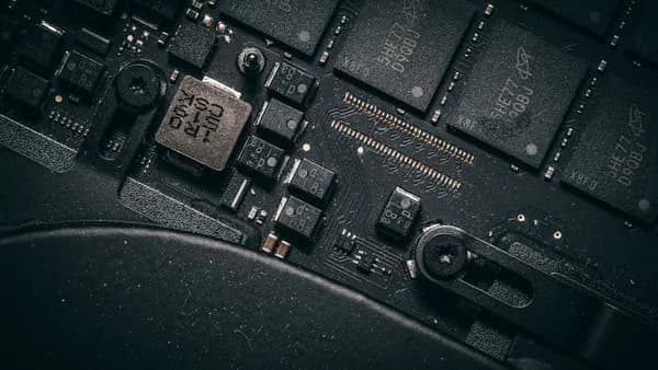 Close-up of a computer motherboard with many components.